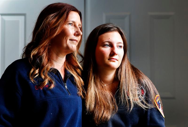 Pamela Yarosz and her daughter Capri, relatives of New York firefighter Christopher Michael Mozzillo, are photographed Saturday, Sept. 7, 2024, in Freehold,N.J.. Mozzillo, who died in the 9/11 attacks, was Pamela's brother. (AP Photo/Noah K. Murray)