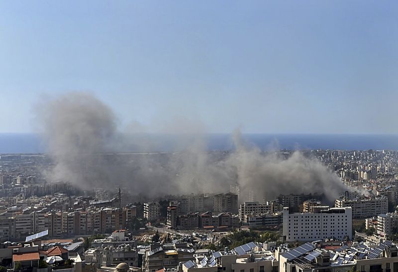 Smoke rises after Israeli airstrikes in Dahiyeh, Beirut, Lebanon, Thursday, Oct. 3, 2024. (AP Photo/Fadi Tawil)