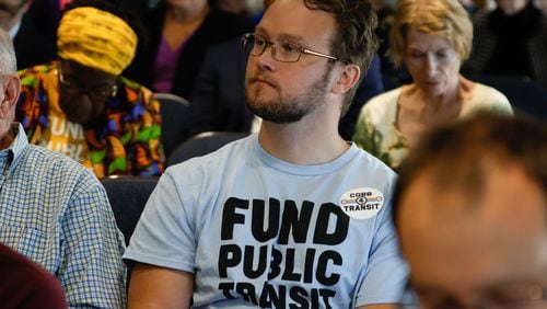 Connor Manthy, a member of the county's Transit Advisory Board, sits among a group of pro-transit advocates in the audience in support of transit expansion as Cobb County commissioners vote along party lines to place the transit tax referendum on the ballot this November.
(Miguel Martinez / AJC)