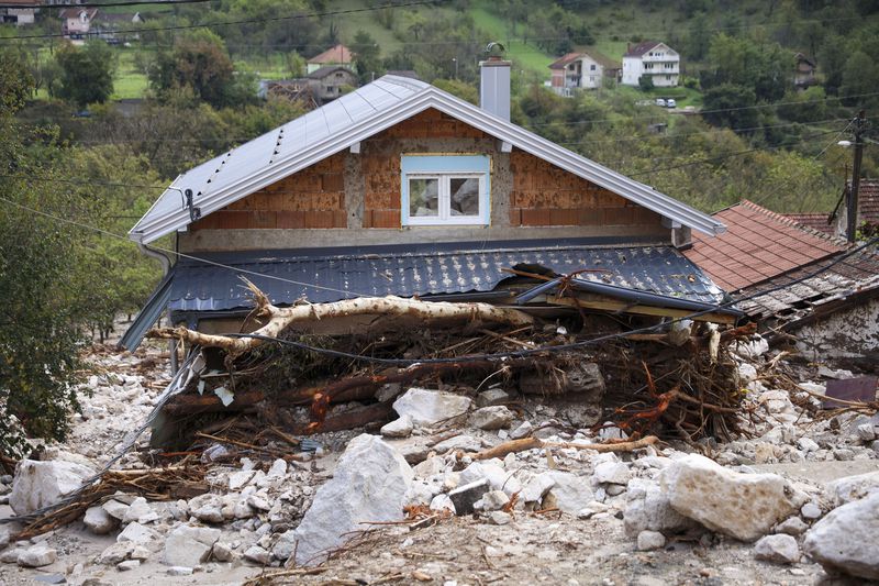 A damaged house is seen after floods and landslides in the village of Donja Jablanica, Bosnia, Saturday, Oct. 5, 2024. (AP Photo/Armin Durgut)