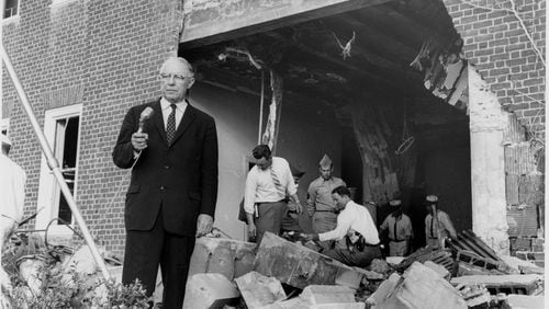 Atlanta Mayor William Hartsfield at the site of the Temple Bombing on Oct. 13, 1958. AJC File photo