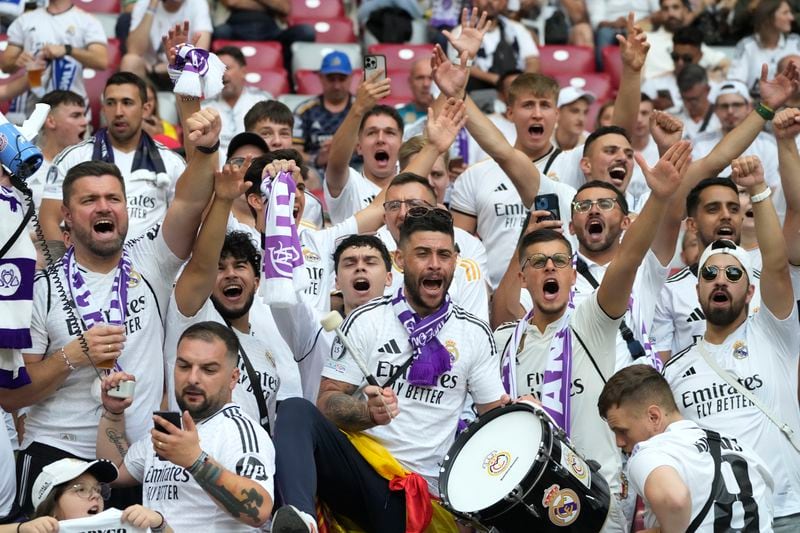 Real Madrid's fans cheer before the UEFA Super Cup Final soccer match between Real Madrid and Atalanta at the Narodowy stadium in Warsaw, Poland, Wednesday, Aug. 14, 2024. (AP Photo/Czarek Sokolowski)