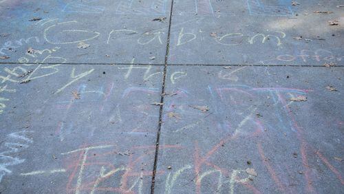 A chalk writing on the Berry College campus of an offensive statement by Republican presidential candidate Donald Trump has been covered by some students with other words, officials said. Photo courtesy of Berry College.