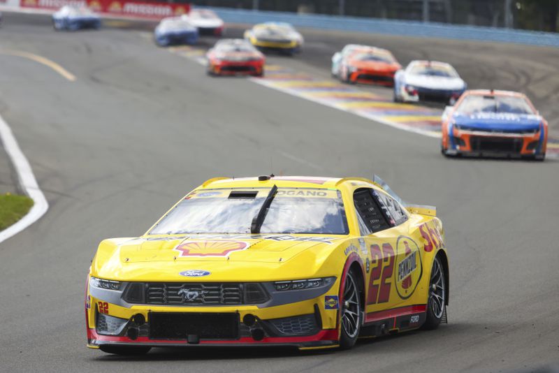 Joey Logano (22) compete in a NASCAR Cup Series auto race, Sunday, Sept. 15, 2024, in Watkins Glen, N.Y. (AP Photo/Lauren Petracca)