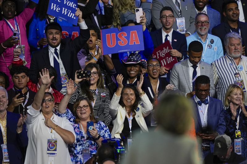 Supporters cheer Hillary Clinton during the Democratic National Convention Monday, Aug. 19, 2024, in Chicago. (AP Photo/Matt Rourke)