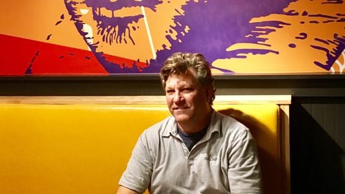Decatur Mellow Mushroom owner Tom Hart, who hopes to serve — paraphrasing Shakespeare’s Brutus — a pizza “dish fit for the gods.” The Bard himself is part of the pizza chain’s new wall art approach, with literary references to, among others Shakespeare, Hemingway and Hunter S. Thompson. The restaurant officially opens Dec. 5. Bill Banks for the AJC