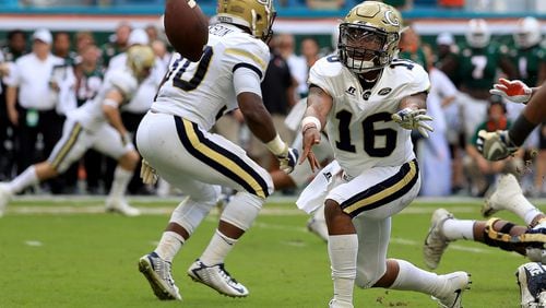 MIAMI GARDENS, FL - OCTOBER 14:  TaQuon Marshall #16 of the Georgia Tech Yellow Jackets pitches the ball during a game against the Miami Hurricanes at Sun Life Stadium on October 14, 2017 in Miami Gardens, Florida.  (Photo by Mike Ehrmann/Getty Images)