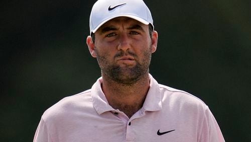 Scottie Scheffler walks up to the seventh green during the second round of the Tour Championship golf tournament, Friday, Aug. 30, 2024, in Atlanta. (AP Photo/Mike Stewart)