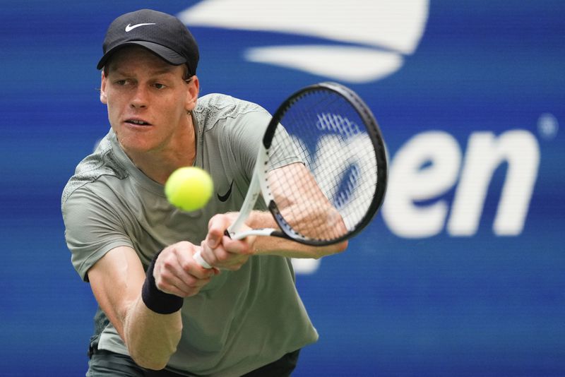 Jannik Sinner, of Italy, returns a shot to Mackenzie McDonald, of the United States, during the first round of the U.S. Open tennis championships, Tuesday, Aug. 27, 2024, in New York. (AP Photo/Kirsty Wigglesworth)