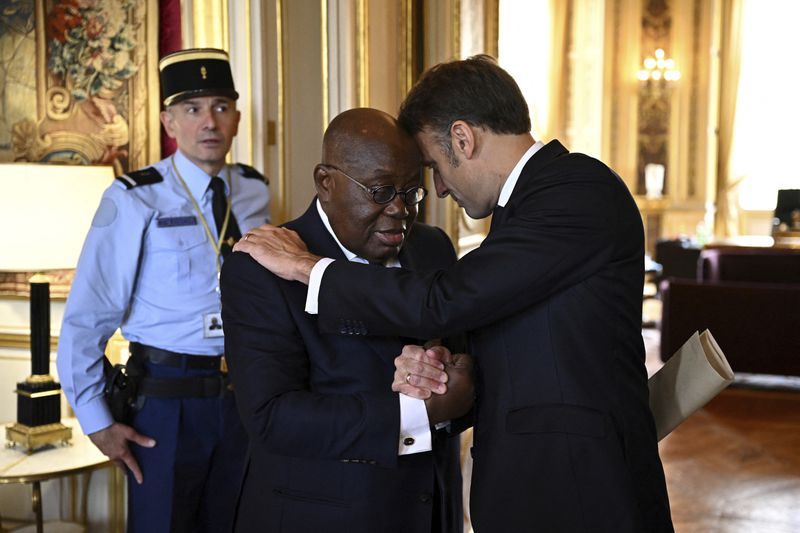 French President Emmanuel Macron greets Ghana's President Nana Akufo-Addo after a meeting during the African Vaccine Manufacturing Accelerator conference, Thursday, June 20, 2024 in Paris. French President Emmanuel Macron is joining some African leaders to kick off a planned $1 billion project to accelerate the rollout of vaccines in Africa, after the coronavirus pandemic bared gaping inequalities in access to them. (Dylan Martinez/Pool via AP)
