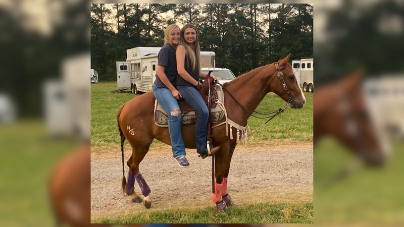Breanna and Kirsten Chadwick enjoy a ride together.