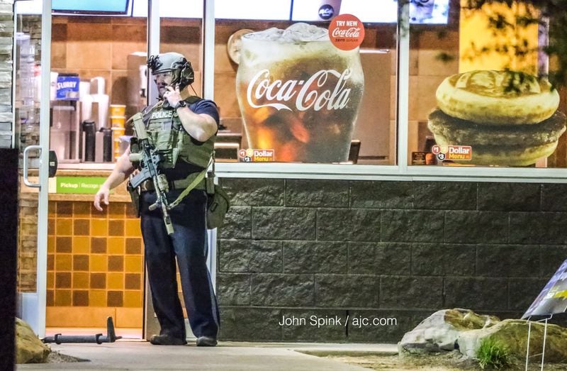 Derrick Hall barricaded himself inside a McDonald’s with a knife, prompting a standoff that lasted for about four hours early Tuesday. JOHN SPINK / JSPINK@AJC.COM