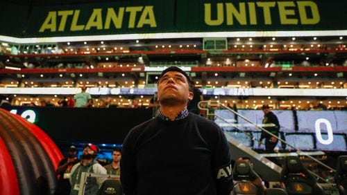 Atlanta United coach Gonzalo Pineda watches the Jumbotron as the team prepares to face the Columbus Crew in Game 2 of a first-round MLS playoff game at Mercedes-Benz Stadium on Tuesday, Nov. 7, 2023. 
 Miguel Martinez / miguel.martinezjimenez@ajc.com