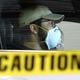 File photo of a man waiting at a drive-through COVID testing site.(Curtis Compton/AJC)