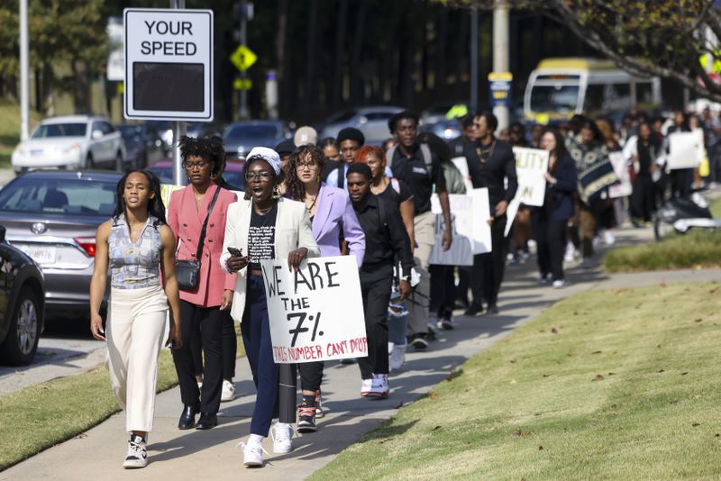 Camille Trotman, a senior Georgia Tech student, and Georgia Tech NAACP president, second from left, leads around 100 students in the U.R.G.E. March for Diversity on the Georgia Tech campus on Oct. 20, 2023, in Atlanta. (Jason Getz / Jason.Getz@ajc.com)