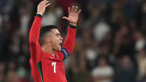 Portugal's Cristiano Ronaldo celebrates after the UEFA Nations League soccer match between Portugal and Scotland at the Luz stadium in Lisbon, Portugal, Sunday, Sept. 8, 2024. (AP Photo/Armando Franca)