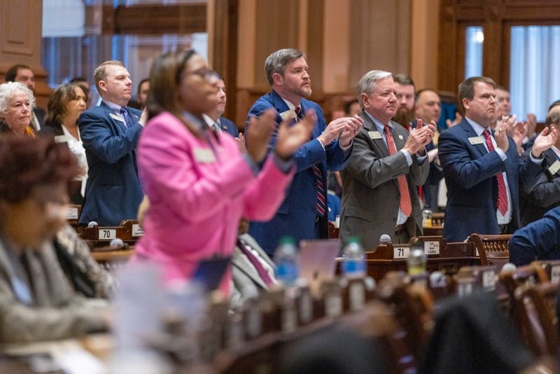 Legislators applaud during Gov. Brian Kemp’s State of the State address at the House of Representatives in the Capitol in Atlanta on Thursday, January 11, 2024. A small but notable item of business has not been taken care of yet at the General Assembly — passing a calendar for the days ahead. (Arvin Temkar/arvin.temkar@ajc.com)