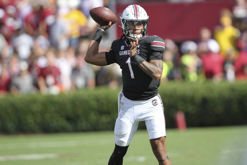 South Carolina quarterback Robby Ashford (1), who replaced injured quarterback LaNorris Sellers (16), throws a short pass late in the second half of an NCAA college football game against LSU Saturday, Sept. 14, 2024 in Columbia, S.C. (AP Photo/Artie Walker Jr.)