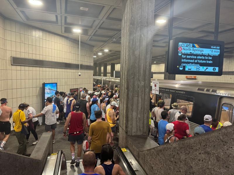 Runners begin their trip home by taking MARTA at Midtown station.