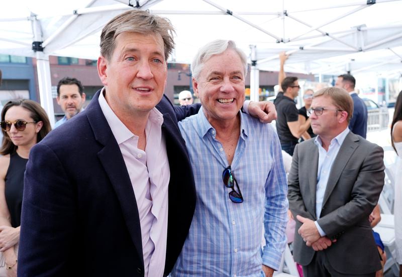 Bill Lawrence, left, creator and executive producer of the Apple TV+ series "Bad Monkey," poses with Carl Hiaasen, author of the novel upon which it is based, at a Hollywood Walk of Fame star ceremony for the show's star Vince Vaughn, Monday, Aug. 12, 2024, in Los Angeles. (AP Photo/Chris Pizzello)