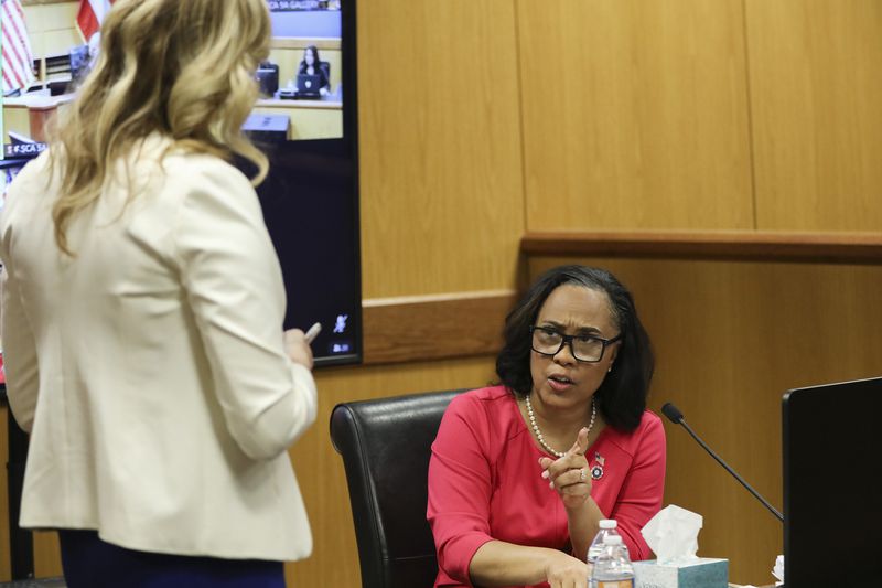 Fulton County District Attorney Fani Willis testifies during a hearing in the case of the State of Georgia v. Donald John Trump at the Fulton County Courthouse on Thursday, Feb. 15, 2024, in Atlanta.  (Alyssa Pointer/Pool/Getty Images/TNS)