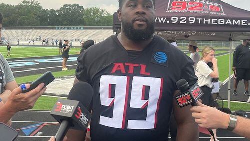 Falcons defensive tackle Eddie Goldman talking to the media after practice at Seckinger High School on Saturday, July 27, 2024.