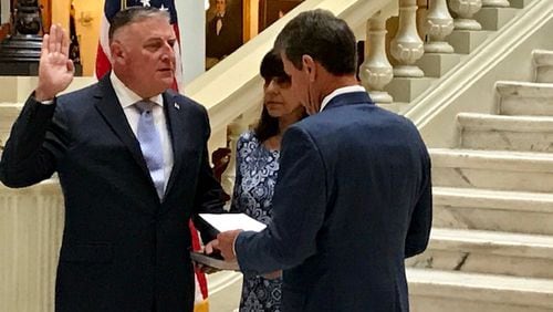 John King, the longtime Doraville police chief, was sworn in Monday as acting Georgia insurance commissioner.