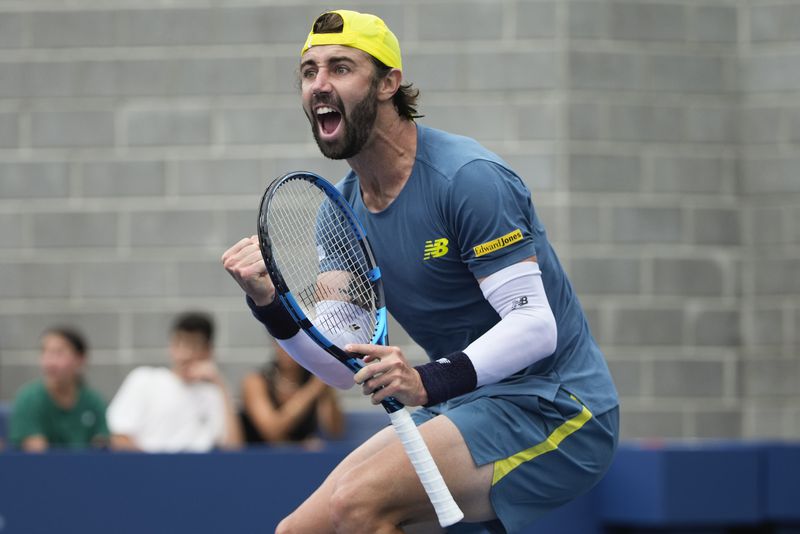 Jordan Thompson, of Australia, reacts after scoring a point against Hubert Hurkacz, of Poland, during the second round of the U.S. Open tennis championships, Thursday, Aug. 29, 2024, in New York. (AP Photo/Pamela Smith)