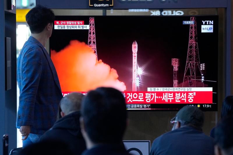 People watch a news program broadcasting file images of a rocket launch by North Korea, at the Seoul Railway Station in Seoul, South Korea, Tuesday, May 28, 2024. A rocket launched by North Korea to deploy the country's second spy satellite exploded shortly after liftoff Monday, state media reported, in a setback for leader Kim Jong Un's hopes to field satellites to monitor the U.S. and South Korea. (AP Photo/Ahn Young-joon)