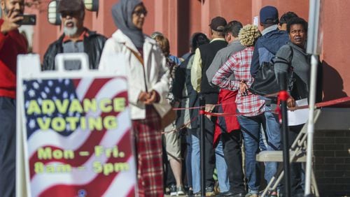 Voters wait to cast ballots in October, 2018 at Cobb County’s elections office in Marietta. JOHN SPINK/JSPINK@AJC.COM