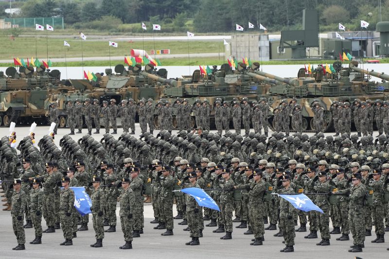 South Korean soldiers salute during the media day for the 76th anniversary of Armed Forces Day at Seoul air base in Seongnam, South Korea, Wednesday, Sept. 25, 2024. (AP Photo/Ahn Young-joon)