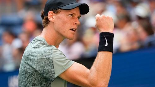 Jannik Sinner, of Italy, reacts after scoring a point against Mackenzie McDonald, of the United States, during the first round of the U.S. Open tennis championships, Tuesday, Aug. 27, 2024, in New York. (AP Photo/Kirsty Wigglesworth)