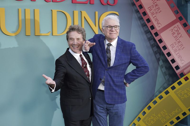 Martin Short, left, and Steve Martin arrive at the premiere of "Only Murders in the Building" at Paramount Pictures on Thursday, Aug. 22, 2024, in Los Angeles. (Photo by Jordan Strauss/Invision/AP)