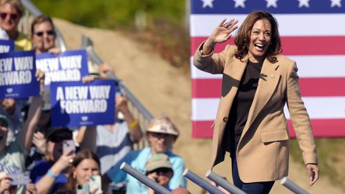 Democratic presidential nominee Vice President Kamala Harris waves as she steps on stage to address a crowd, Wednesday, Sept. 4, 2024, during a campaign stop, in North Hampton, N.H. (AP Photo/Steven Senne)