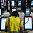 Dekalb County Elections officals conduct logic and accuracy testing of Dominion voting machines in September. (Ben Hendren for The Atlanta Journal-Constitution)