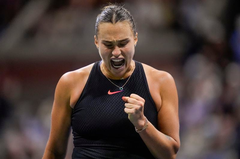 Aryna Sabalenka, of Belarus, reacts after scoring a point against Emma Navarro, of the United States, during the women's singles semifinals of the U.S. Open tennis championships, Thursday, Sept. 5, 2024, in New York. (AP Photo/Julia Nikhinson)