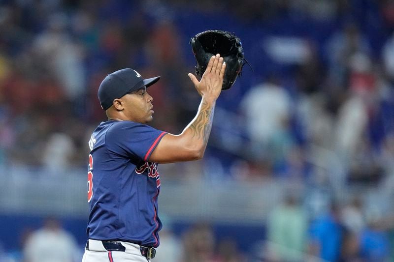 Braves closer Raisel Iglesias celebrates Sunday's win over the Marlins.