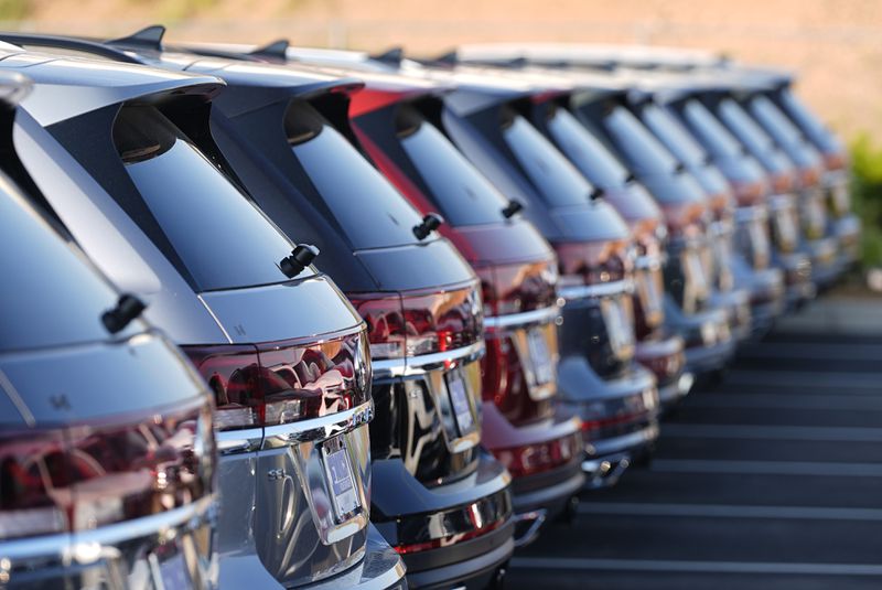 FILE - A row of unsold 2024 Atlas utility vehicles is shown July 28, 2024, at a Volkswagen dealership in Denver. (AP Photo/David Zalubowski, File)