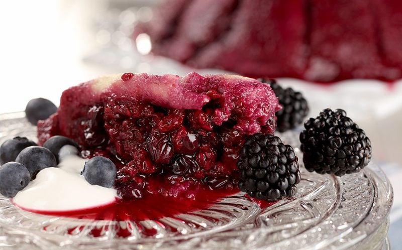 The berry filling for the summer pudding stains the bread slices with its vibrantly colored juices. (Food styling by Mark Graham.) (Michael Tercha/Chicago Tribune/TNS)