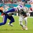 Buffalo Bills linebacker Von Miller (40) sacks Miami Dolphins quarterback Skylar Thompson (19) during the second half of an NFL football game, Thursday, Sept. 12, 2024, in Miami Gardens, Fla. (AP Photo/Rebecca Blackwell)