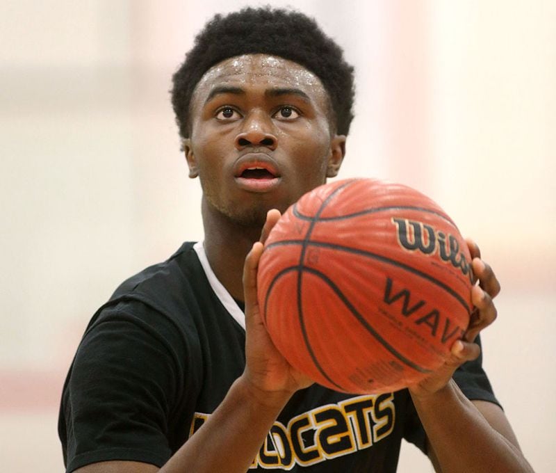 Wheeler's Jaylen Brown attempts a free throw in a game against North Gwinnett on February 27, 2014. Jason Getz / Special to the AJC Wheeler's Jaylen Brown. ( Jason Getz / Special to AJC)