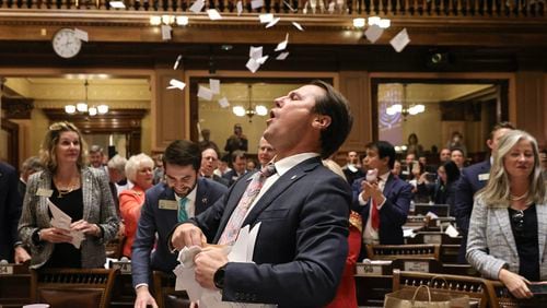 Rep. James Burchett (R-Waycross) celebrates at the conclusion of the legislative session in the House Chamber on Sine Die, the last day of the General Assembly at the Georgia State Capitol in Atlanta on Wednesday, March 29, 2023. (Natrice Miller/ natrice.miller@ajc.com)