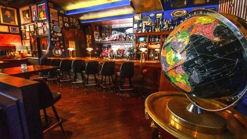 200630 Atlanta, Ga: One item that is consistent in the decoration of The Consulate is the globe as they occasionally allow a lucky patron to close their eyes and stop the globe and putting their finger on the next country's cuisine for the next menu. The Consulate restaurant in midtown Atlanta, Ga. Owner, Douglas Hines, who purchased items and decorated much of the space himself, wanted an open inviting floorplan "but not a mess hall" with many different spaces for patrons to move about in. As the restaurant is open mainly in evening hours it's decorated with muted outside light in mind. Living & Arts Sunday Living cover story on black-owned restaurants in the metro Atlanta area and the recent challenges they have had to overcome, including navigating their business during the coronavirus pandemic as well as during protest and calls to action against racial injustice. These operators also share their thoughts about the path forward.  (CONTRIBUTED BY CHRIS HUNT PHOTOGRAPHY)