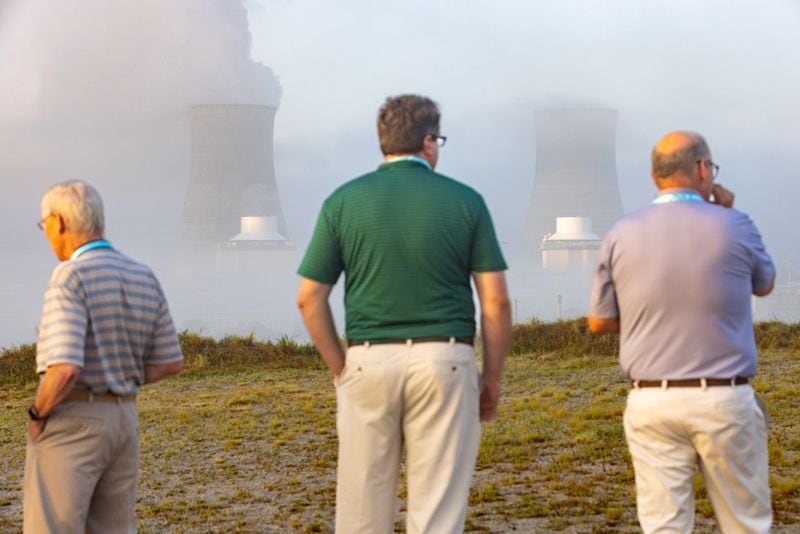 Spectators look at new units 3 and 4 before a ceremony at Plant Vogtle in Burke County last July.
