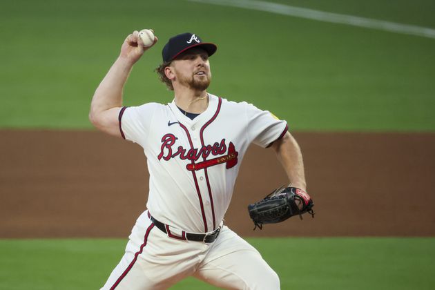 Atlanta Braves pitcher Spencer Schwellenbach (56) delivers to a New York Mets batter during the first inning at Truist Park, Tuesday, Sept. 24, 2024, in Atlanta. (Jason Getz / AJC)

