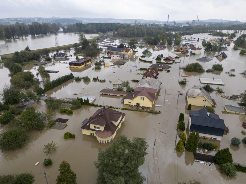 An aerial view of a flooded neighbourhood in Ostrava, Czech Republic, Monday, Sept. 16, 2024. (AP Photo/Darko Bandic)