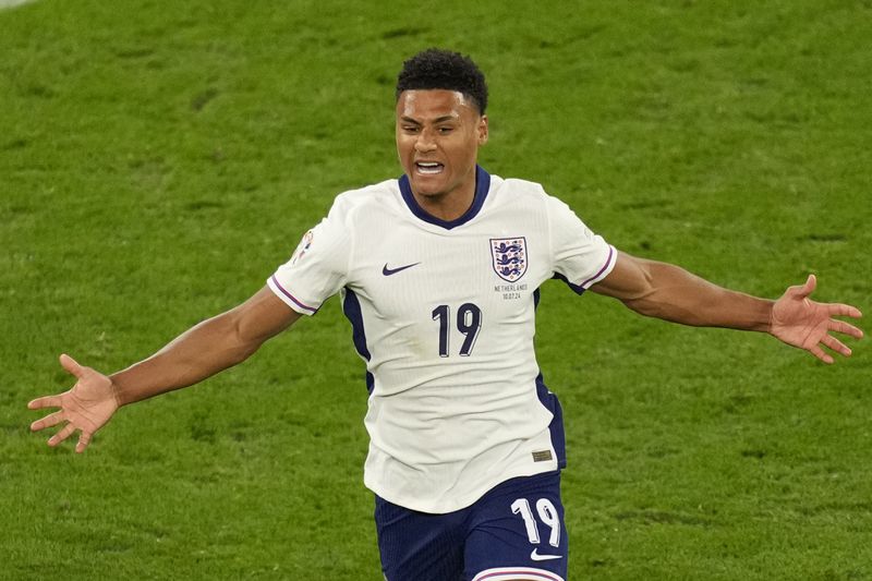 England's Ollie Watkins celebrates after scoring his side's second goal during a semifinal match between the Netherlands and England at the Euro 2024 soccer tournament in Dortmund, Germany, Wednesday, July 10, 2024. (AP Photo/Andreea Alexandru)