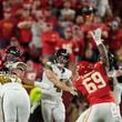 New Orleans Saints quarterback Derek Carr (4) throws over Kansas City Chiefs nose tackle Mike Pennel (69) during the first half of an NFL football game Monday, Oct. 7, 2024, in Kansas City, Mo. (AP Photo/Charlie Riedel)