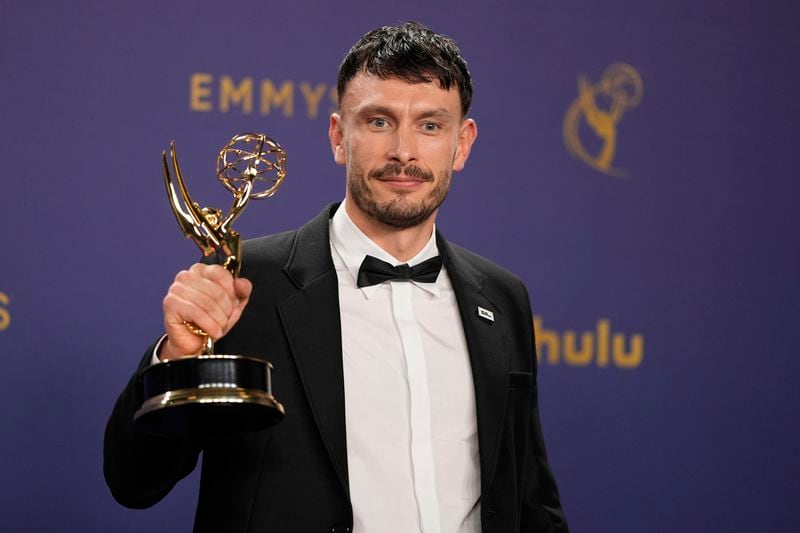 Richard Gadd poses in the press room with the award for outstanding writing for a limited or anthology series or movie for "Baby Reindeer" during the 76th Primetime Emmy Awards on Sunday, Sept. 15, 2024, at the Peacock Theater in Los Angeles. (AP Photo/Jae C. Hong)