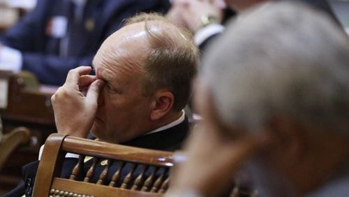 State Rep. Dan Gasaway, R-Homer, (left) and state Rep. “Coach” Williams, D-Avondale Estates, during extended debate in the state House in 2016. BOB ANDRES / BANDRES@AJC.COM